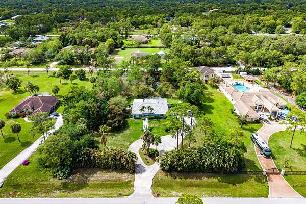 1.86 Acres of Land with Home for Sale in Loxahatchee Groves, Florida