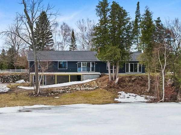 10 Acres of Land with Home for Sale in Charlevoix, Michigan