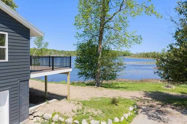 10 Acres of Land with Home for Sale in Charlevoix, Michigan