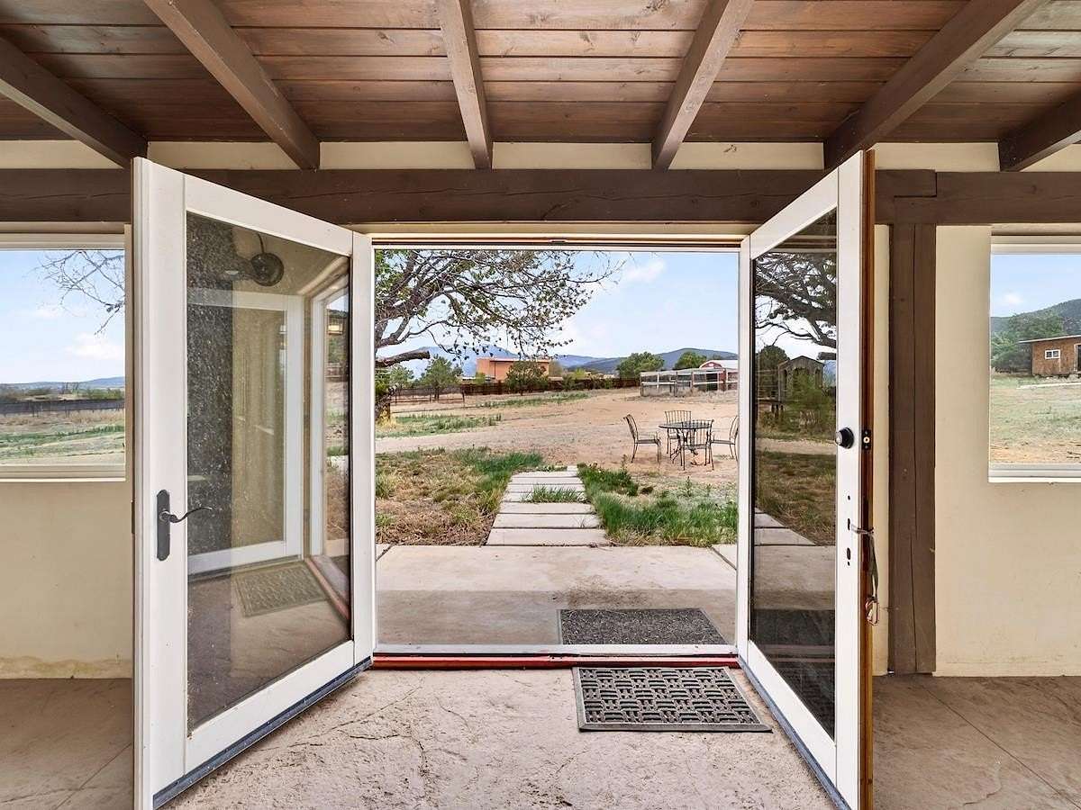 3 Acres of Land with Home for Sale in Ranchos de Taos, New Mexico