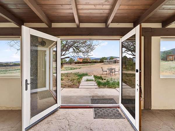 3 Acres of Land with Home for Sale in Ranchos de Taos, New Mexico