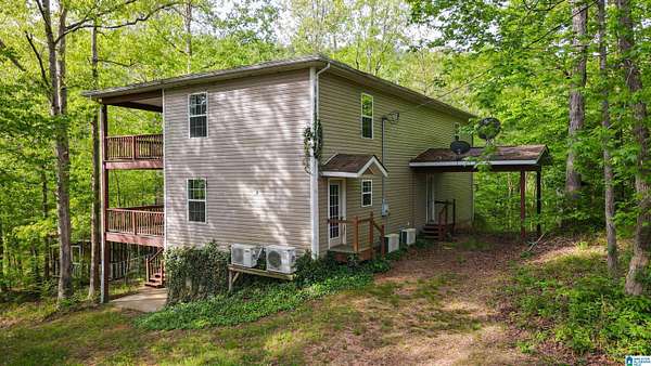 1.72 Acres of Land with Home for Sale in Delta, Alabama