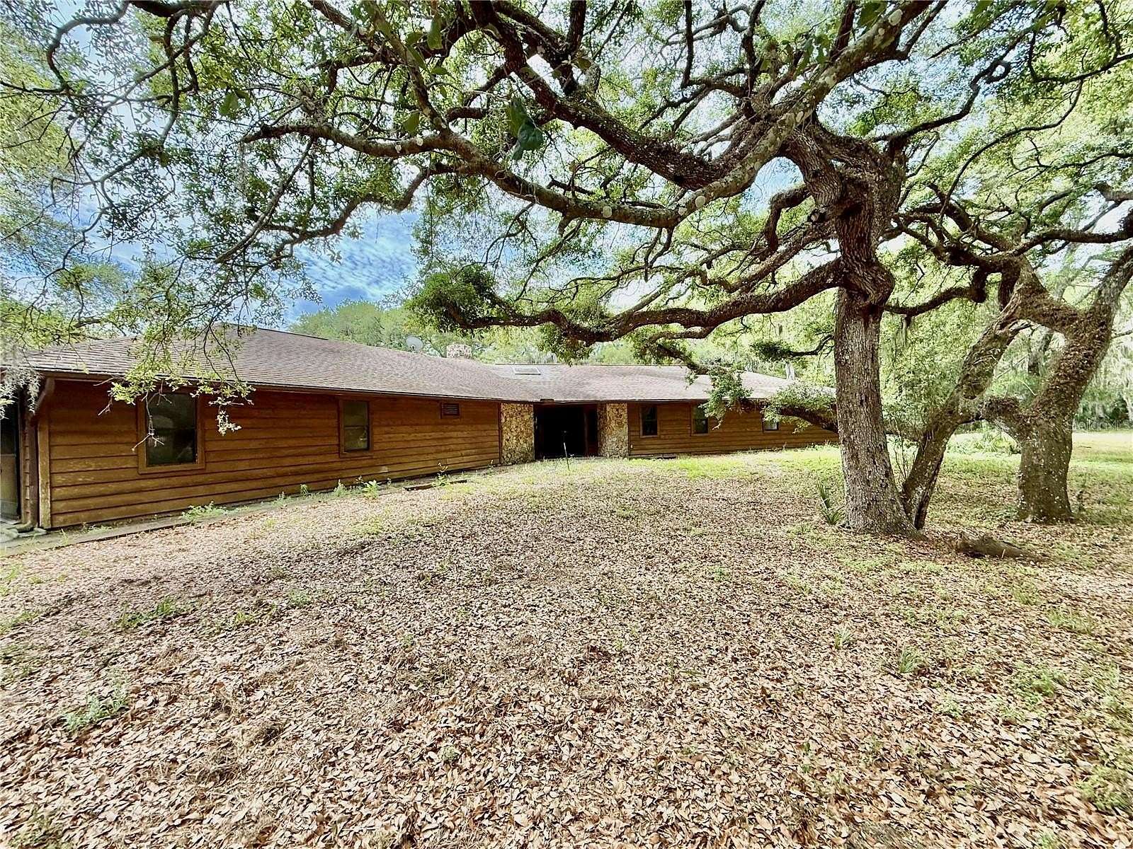 4.8 Acres of Land with Home for Sale in Oak Hill, Florida