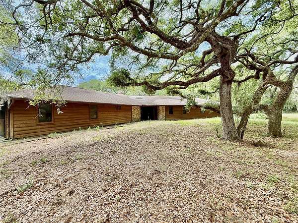 4.8 Acres of Land with Home for Sale in Oak Hill, Florida