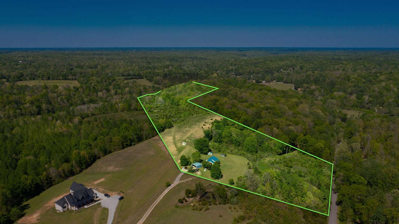 37 Acres of Land with Home for Sale in Charlotte, Tennessee