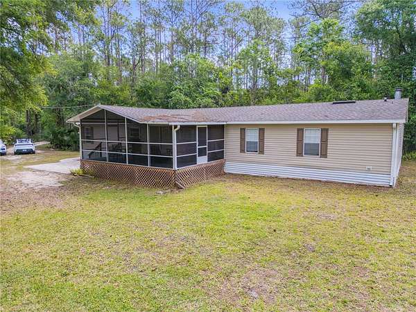 4.9 Acres of Land with Home for Sale in Port Orange, Florida