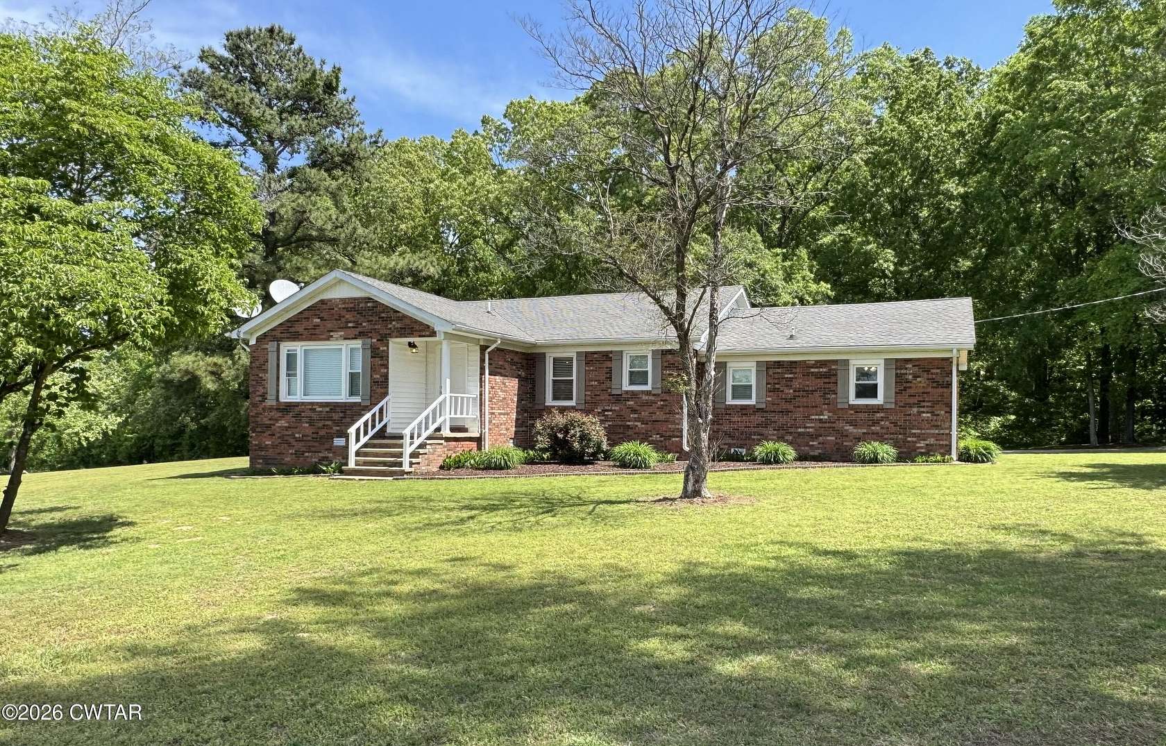 10.7 Acres of Recreational Land with Home for Sale in McKenzie, Tennessee