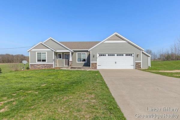 2.24 Acres of Land with Home for Sale in Rockford, Michigan