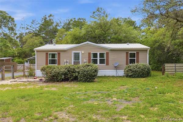 2.63 Acres of Land with Home for Sale in Dunnellon, Florida