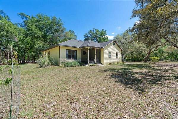 2.56 Acres of Land with Home for Sale in Melrose, Florida