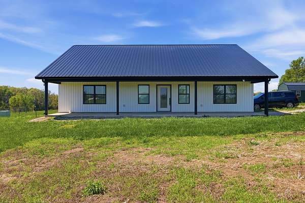 12.4 Acres of Land with Home for Sale in Phillipsburg, Missouri