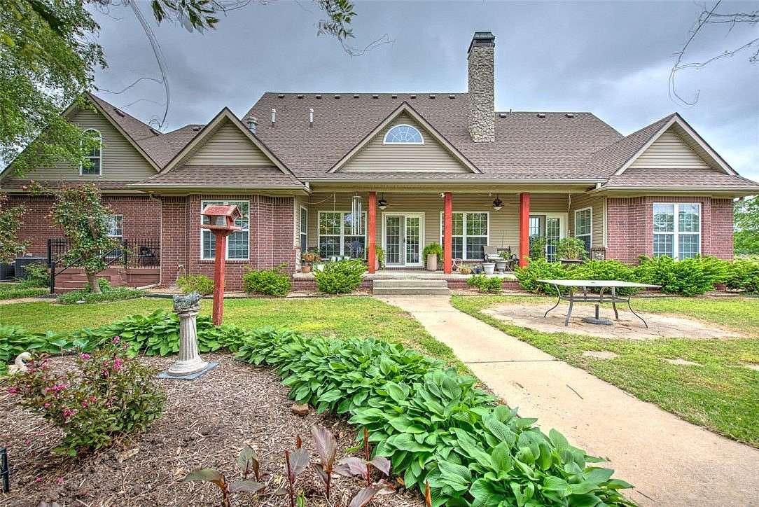 5 Acres of Land with Home for Sale in Lowell, Arkansas