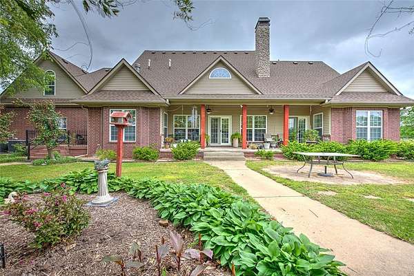 5 Acres of Land with Home for Sale in Lowell, Arkansas