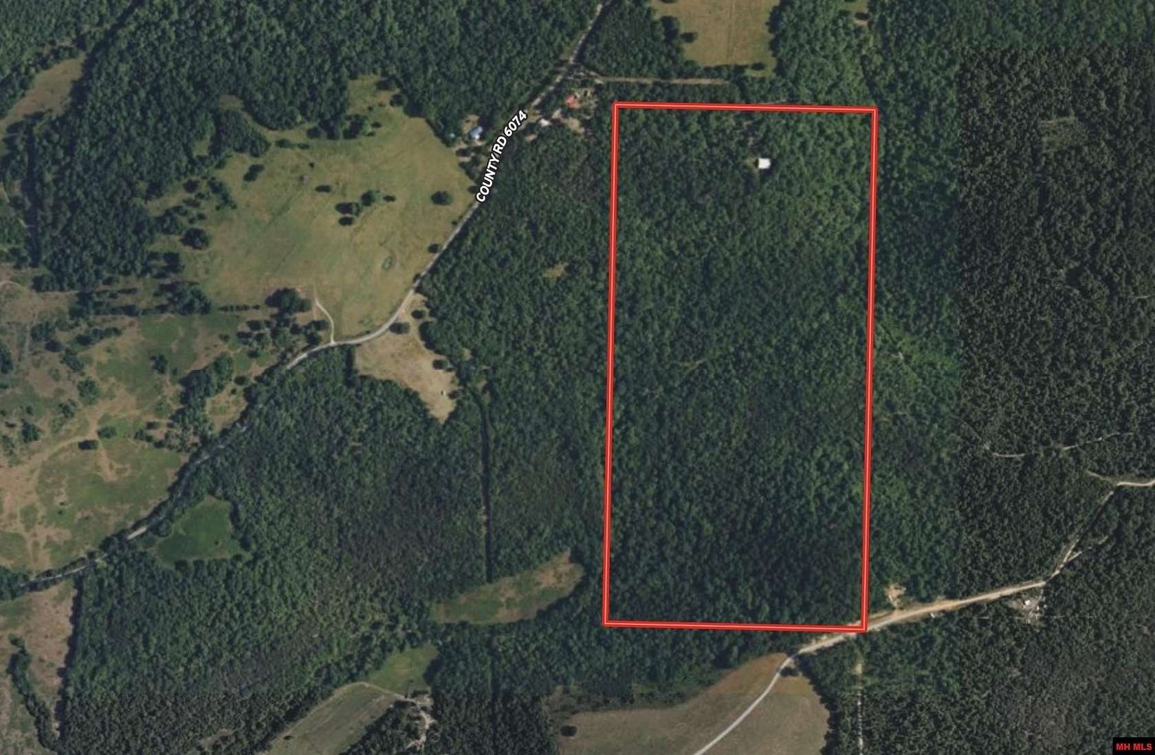 80 Acres of Recreational Land with Home for Sale in Flippin, Arkansas