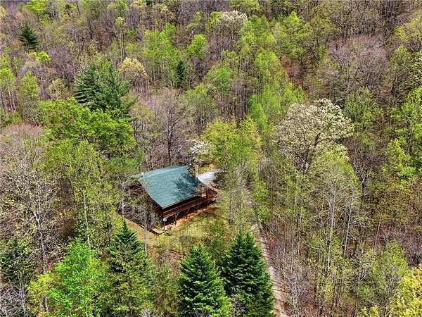 10.4 Acres of Land with Home for Sale in Lenoir, North Carolina