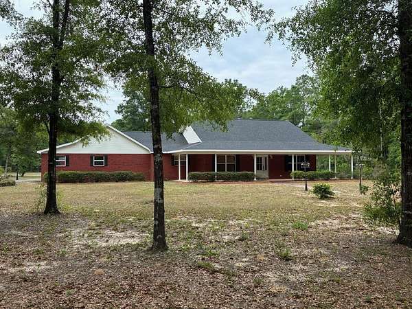 2.48 Acres of Land with Home for Sale in Baker, Florida