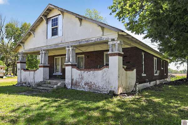 2 Acres of Land with Home for Sale in Arlington, Kentucky