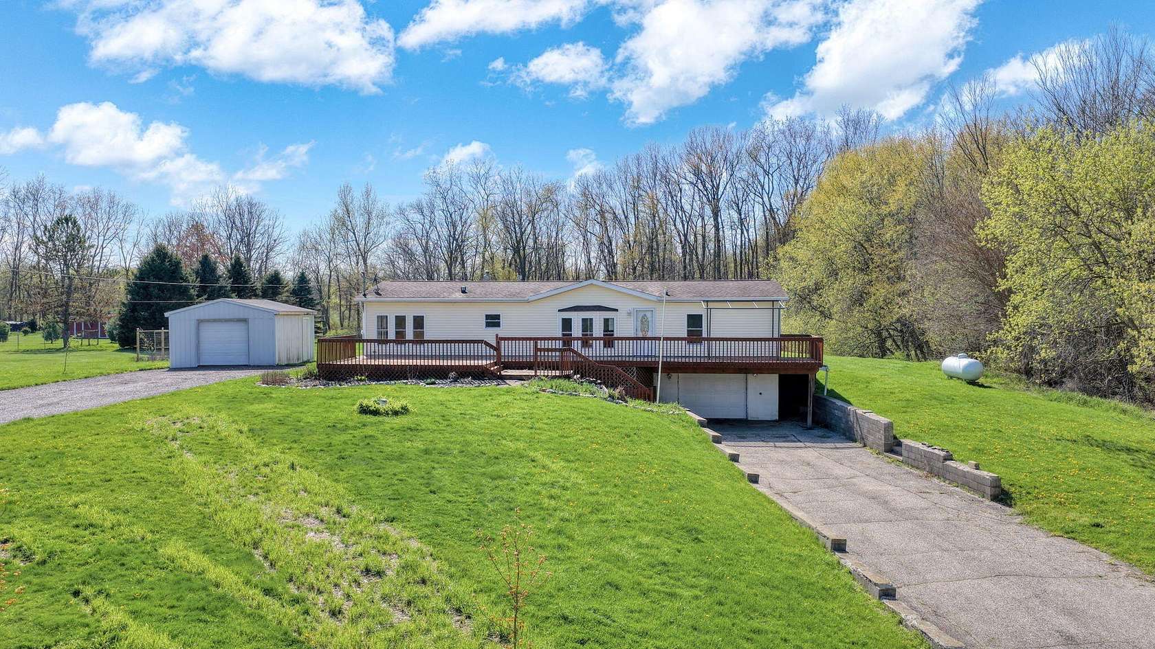 5 Acres of Land with Home for Sale in Munith, Michigan