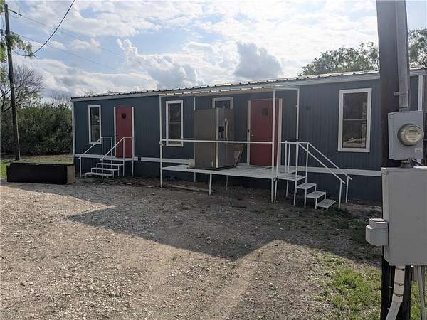 14 Acres of Land with Home for Lease in Orange Grove, Texas