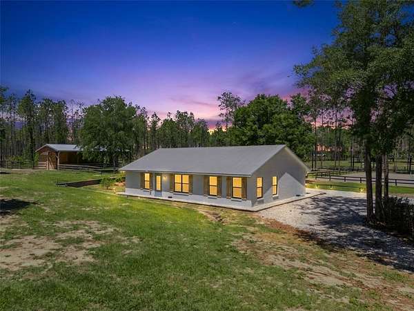4.86 Acres of Land with Home for Sale in Eustis, Florida