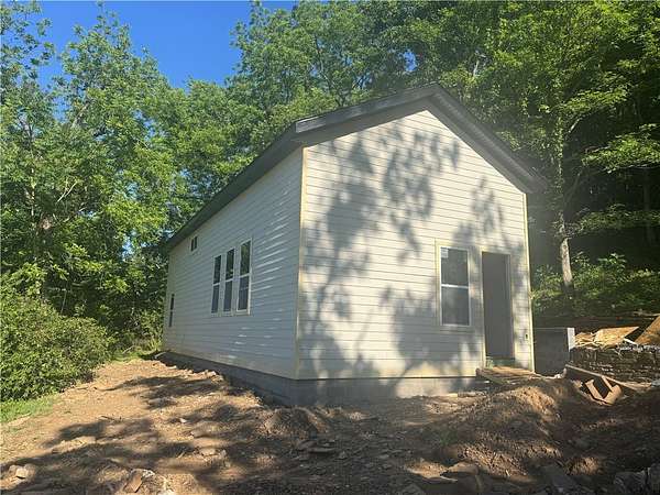 1.67 Acres of Land with Home for Sale in Combs, Arkansas
