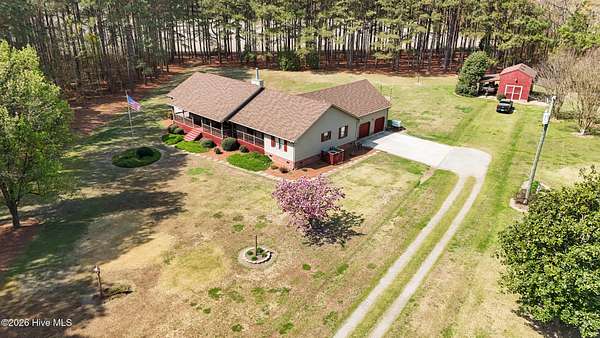 6.9 Acres of Land with Home for Sale in Camden, North Carolina