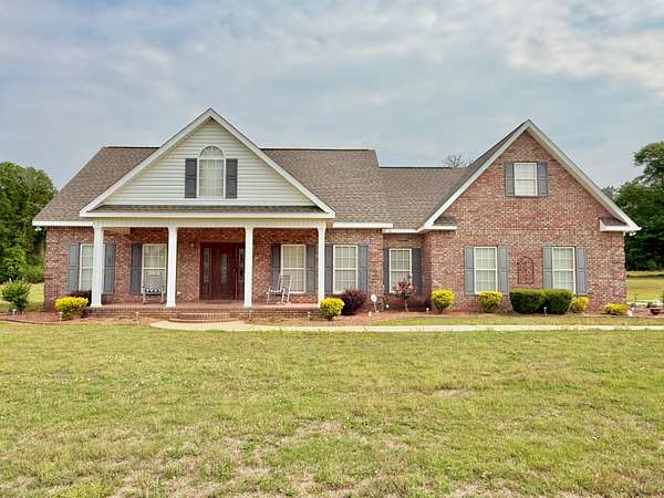 9.7 Acres of Land with Home for Sale in Black, Alabama
