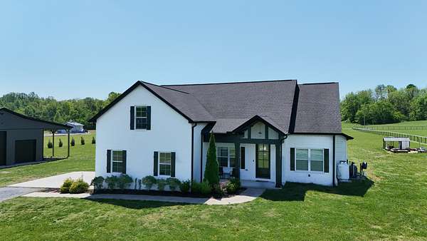 5.2 Acres of Land with Home for Sale in Cross Plains, Tennessee