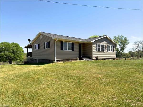 1.74 Acres of Land with Home for Sale in State Road, North Carolina