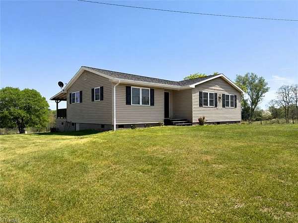 1.74 Acres of Land with Home for Sale in State Road, North Carolina