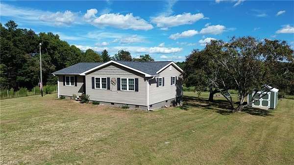 1.74 Acres of Land with Home for Sale in State Road, North Carolina