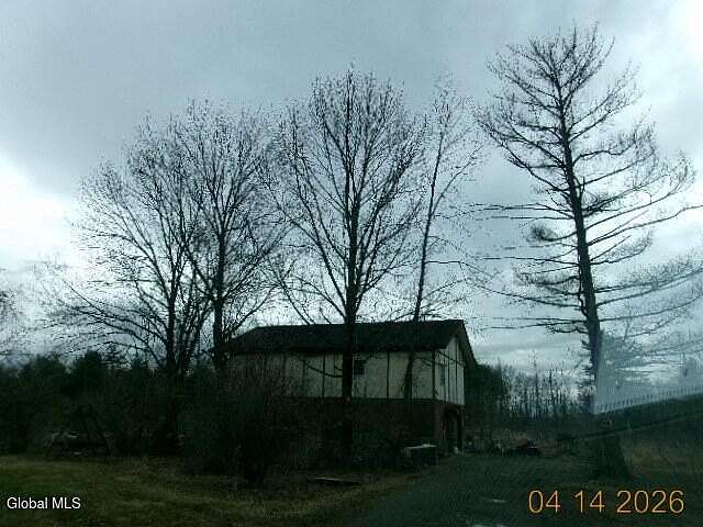 3 Acres of Land with Home for Auction in Queensbury, New York