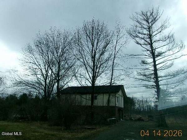 3 Acres of Land with Home for Auction in Queensbury, New York
