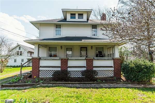 4.6 Acres of Land with Home for Auction in Creston, Ohio