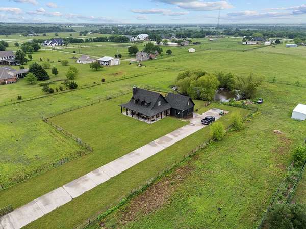 2.87 Acres of Land with Home for Sale in McLendon-Chisholm, Texas