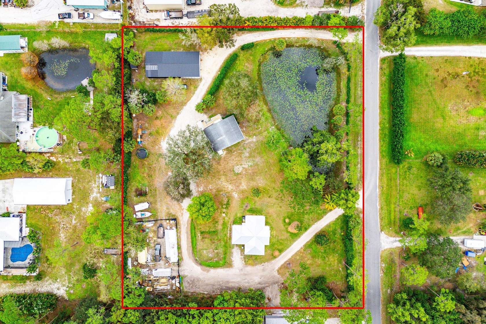2.5 Acres of Land with Home for Sale in Jupiter, Florida