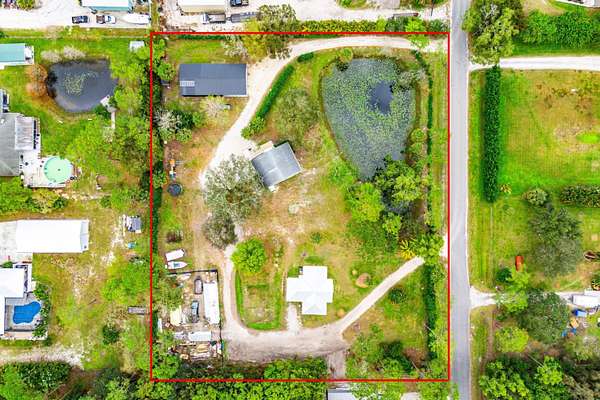 2.5 Acres of Land with Home for Sale in Jupiter, Florida
