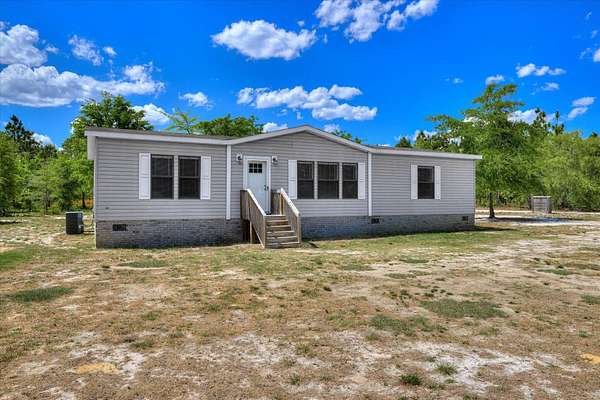 20.4 Acres of Recreational Land with Home for Sale in Matthews, Georgia