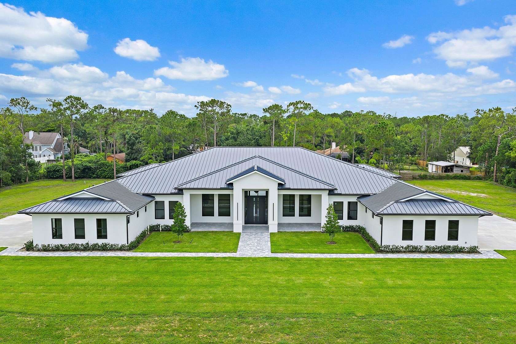 2.5 Acres of Land with Home for Sale in Jupiter, Florida