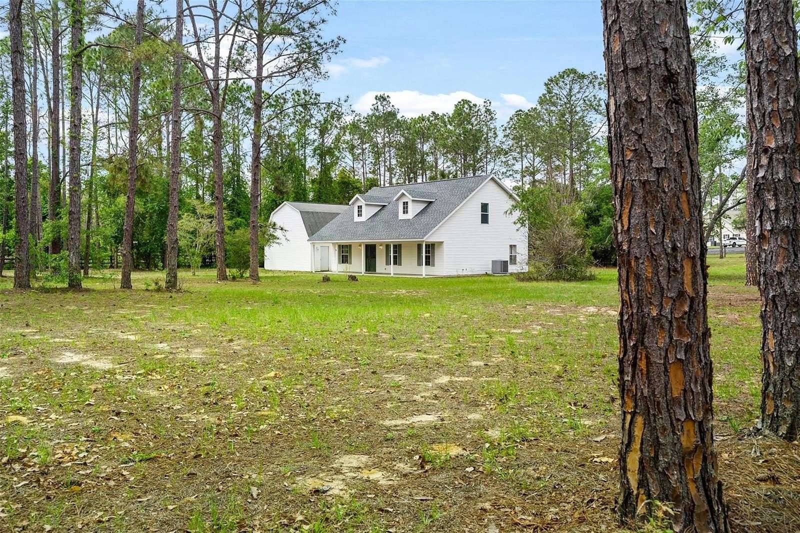 4.85 Acres of Land with Home for Sale in Eustis, Florida