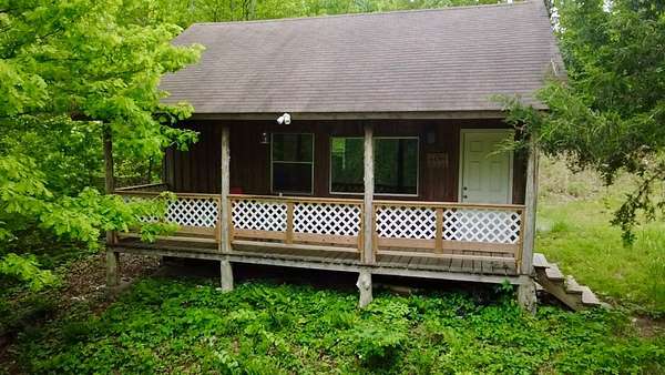 24.3 Acres of Recreational Land with Home for Sale in St. Joe, Arkansas