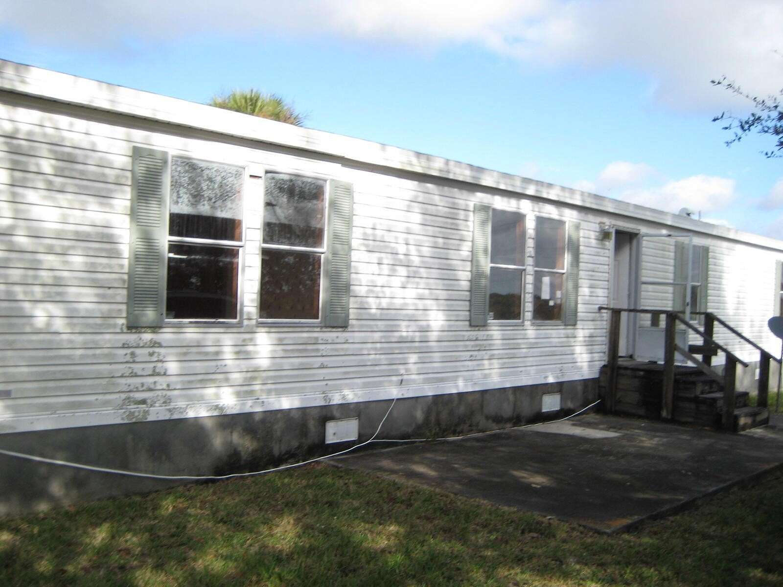 2.5 Acres of Land with Home for Sale in Okeechobee, Florida