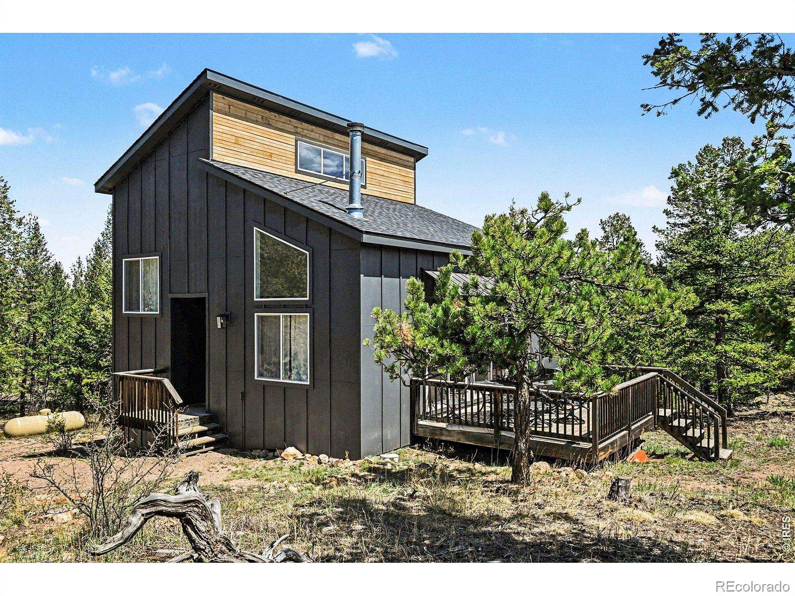 4 Acres of Land with Home for Sale in Red Feather Lakes, Colorado