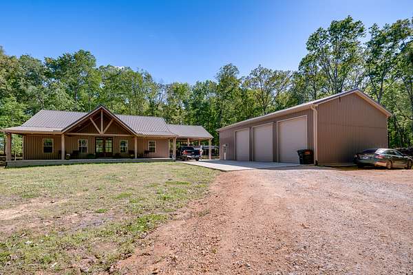 5.12 Acres of Land with Home for Sale in Lawrenceburg, Tennessee