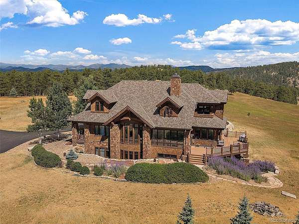 35.3 Acres of Agricultural Land with Home for Sale in Indian Hills, Colorado