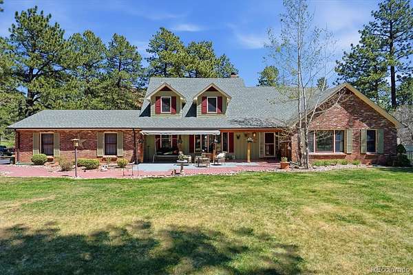 2.57 Acres of Land with Home for Sale in Larkspur, Colorado