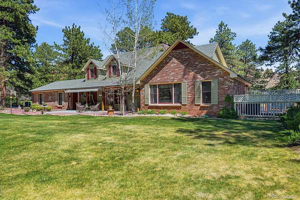 2.57 Acres of Land with Home for Sale in Larkspur, Colorado