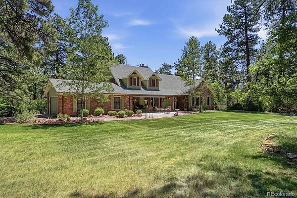 2.57 Acres of Land with Home for Sale in Larkspur, Colorado