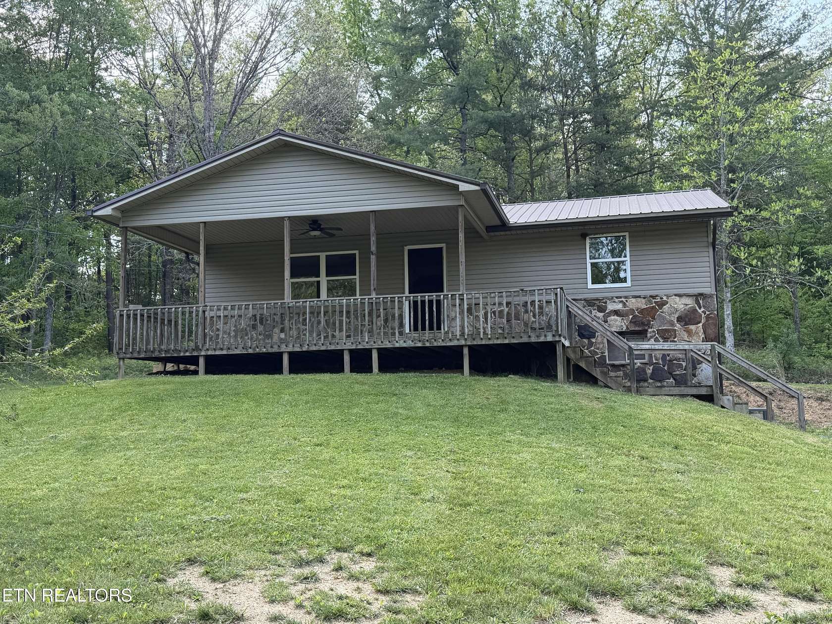 1.83 Acres of Land with Home for Sale in Lancing, Tennessee