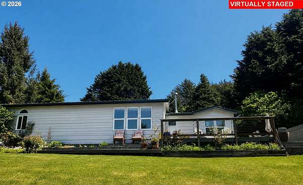 5 Acres of Land with Home for Sale in Gold Beach, Oregon
